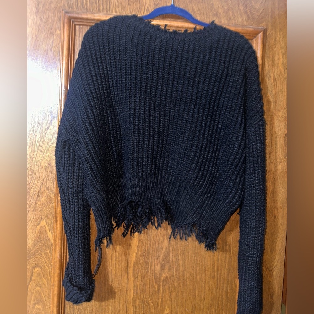 Distressed sweater